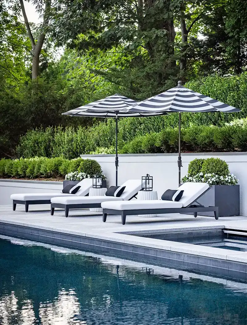 3 lounge chairs at pool